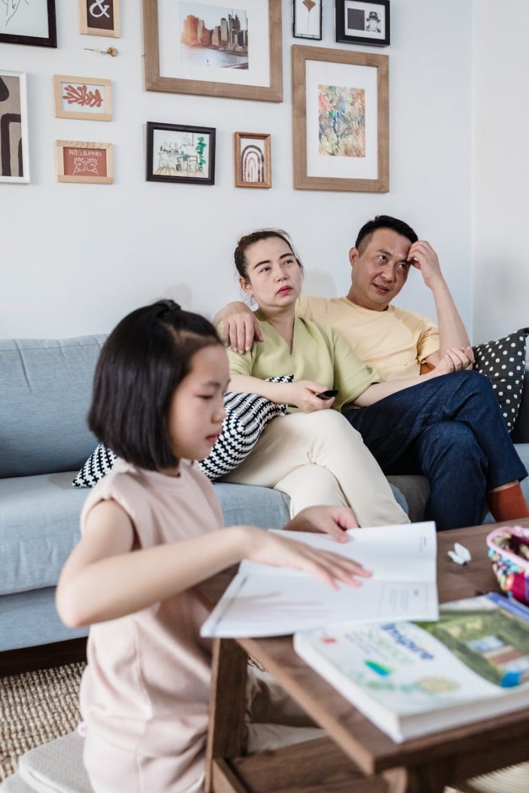 A family enjoying quality time together in a beautifully decorated living room.